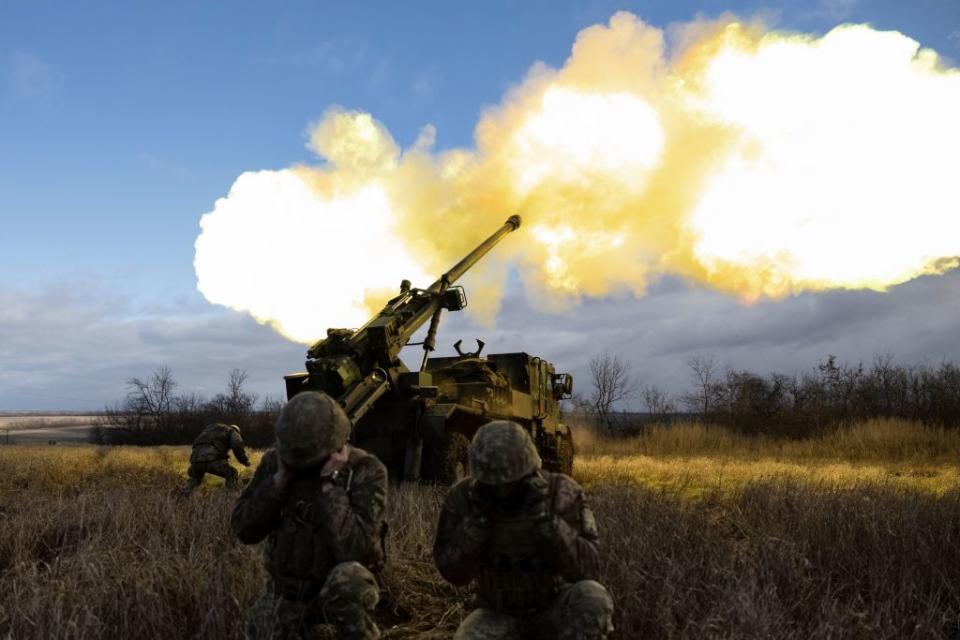 Ukrainian servicemen fire with a French-made CAESAR self-propelled howitzer toward Russian positions in eastern Ukraine on Dec. 28, 2022. (Sameer Al-Doumy/AFP via Getty Images)