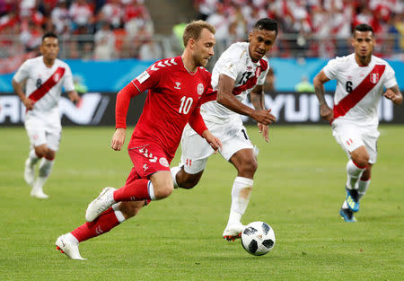 Soccer Football - World Cup - Group C - Peru vs Denmark - Mordovia Arena, Saransk, Russia - June 16, 2018 Denmark's Christian Eriksen in action with Peru's Renato Tapia REUTERS/Max Rossi