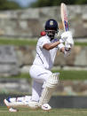 India's Ajinkya Rahane plays a shot against West Indies during day one of the first Test cricket match at the Sir Vivian Richards cricket ground in North Sound, Antigua and Barbuda, Thursday, Aug. 22, 2019. (AP Photo/Ricardo Mazalan)