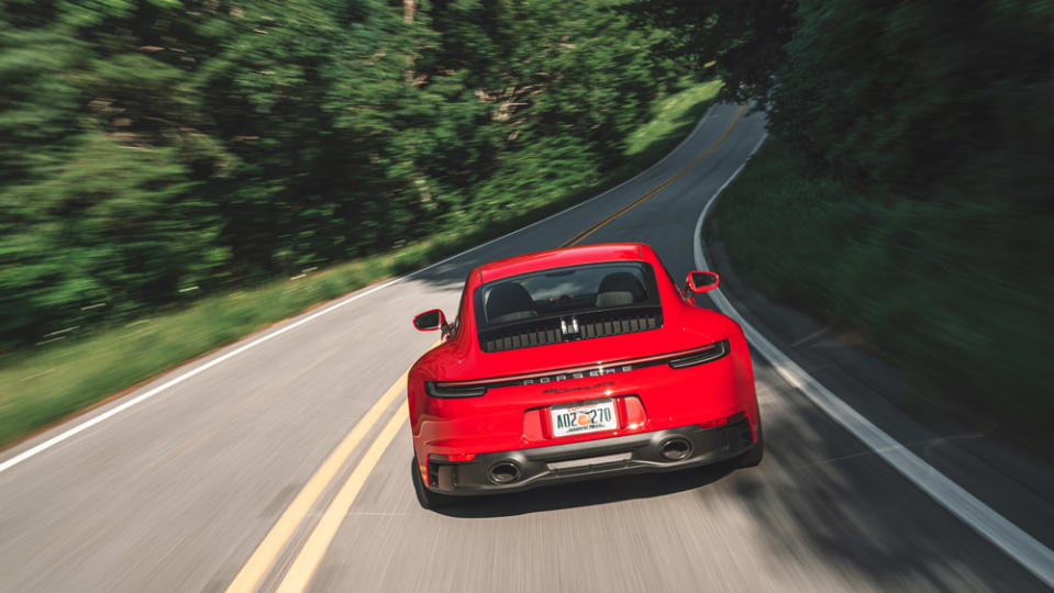 Toss the 911 GTS into a corner and its wide rear tires hunker down and stick. - Credit: Photo: Courtesy of Porsche AG.