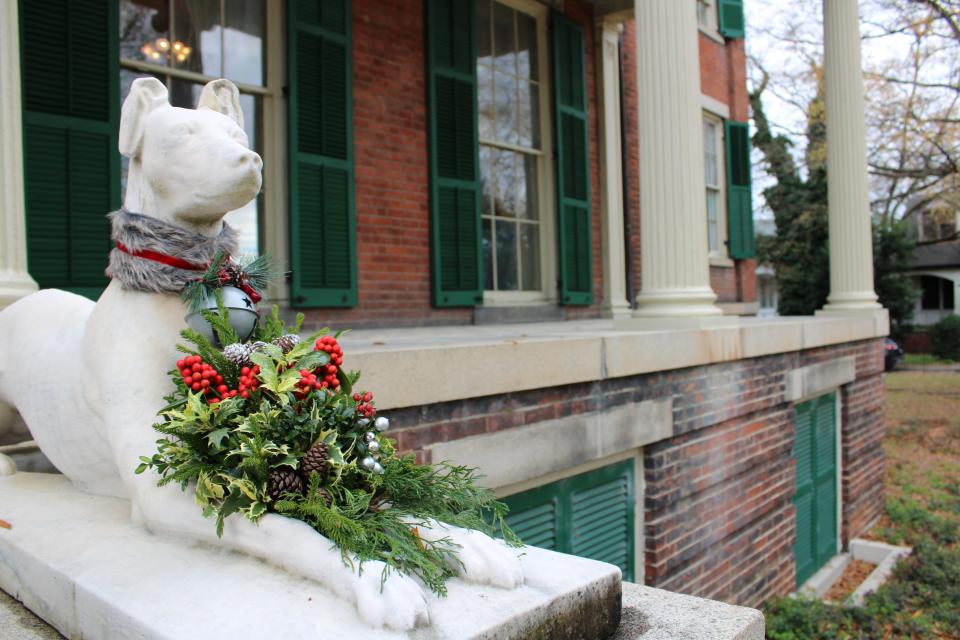 Statue adorned by the Petersburg Garden Club at the Centre Hill Mansion Museum in Dec. of 2020.