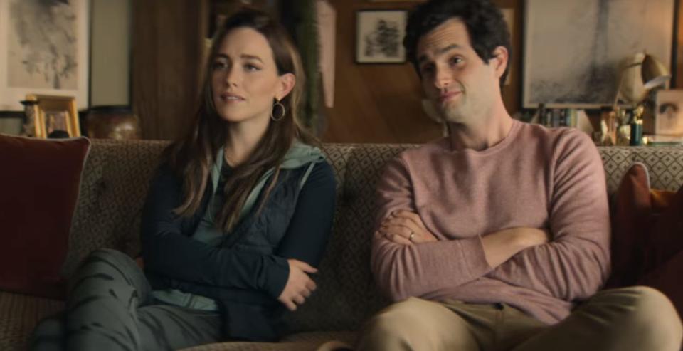 Love and Joe sitting on a couch on season three of "You"