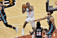 Los Angeles Clippers forward Kawhi Leonard (2) jumps to shoot against Memphis Grizzlies forward Kyle Anderson (1) in the second half of an NBA basketball game Thursday, Feb. 25, 2021, in Memphis, Tenn. (AP Photo/Brandon Dill)