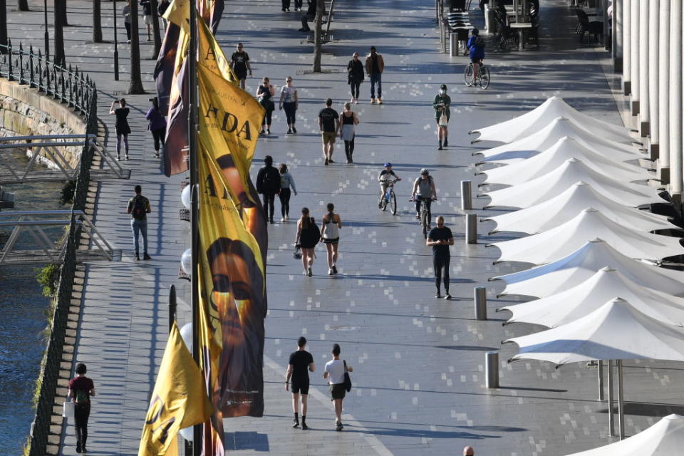 People are seen walking around Circular Quay.