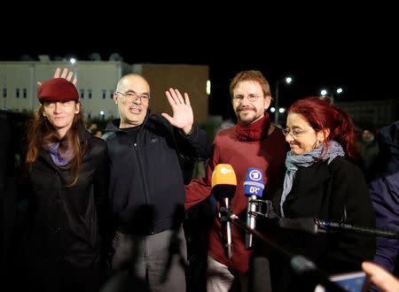 German citizen Peter Frank Steudtner (2nd R) and Swedish citizen Ali Gharavi (2nd L) talk to journalists after being released from the Silivri prison complex near Istanbul, Turkey October 26, 2017. REUTERS/Osman Orsal