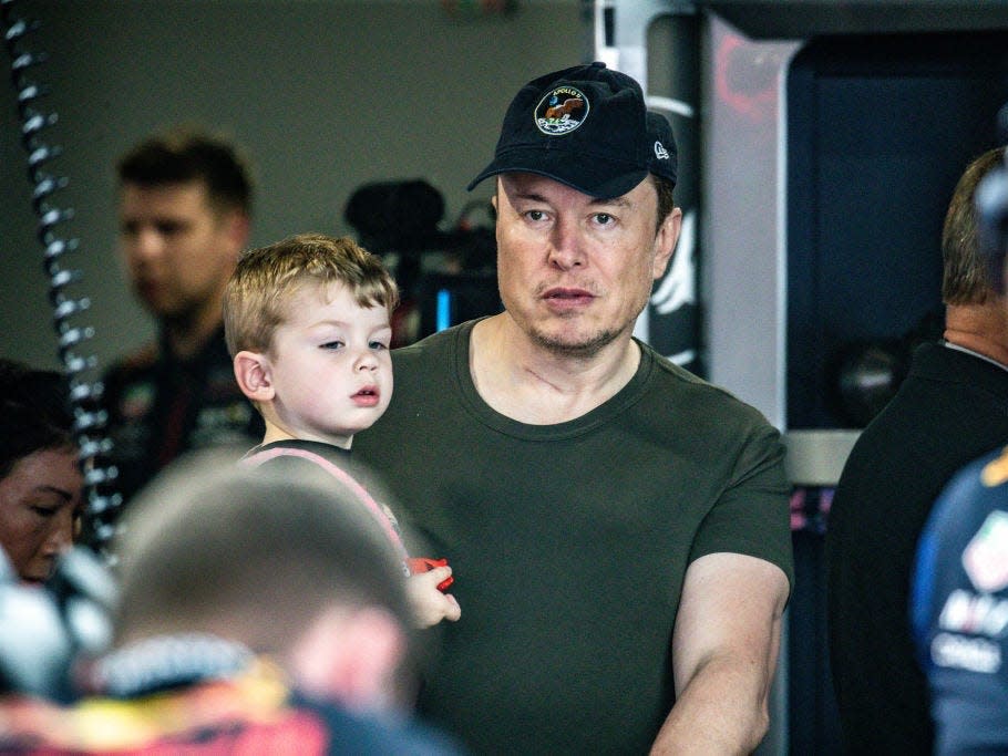 Elon Musk with baby X.