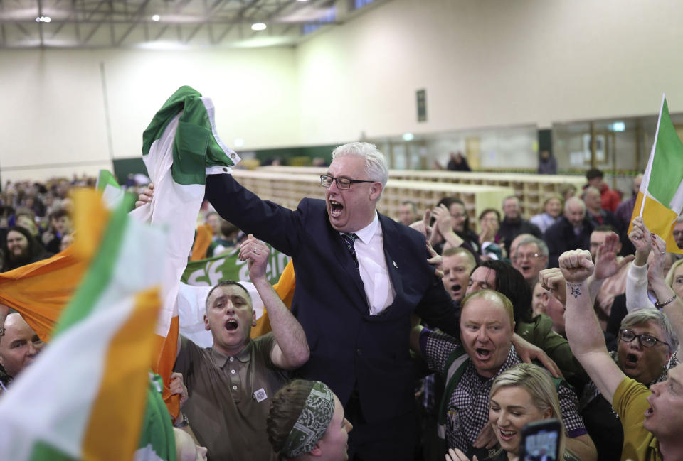 Thomas Gould of Sinn Fein tops the poll and is elected in Cork North Central, during the Irish General Election count at the Nemo Rangers GAA Club in Cork, Ireland. (Yui Mok/PA via AP)