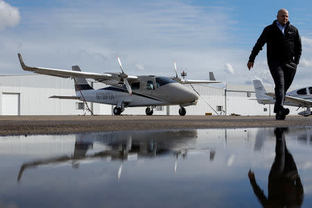 Coast Flight Training president Bryan Simmons walks past some of his company's training aircraft used for instruction in San Diego, California, U.S., January 15, 2019. REUTERS/Mike Blake/Files