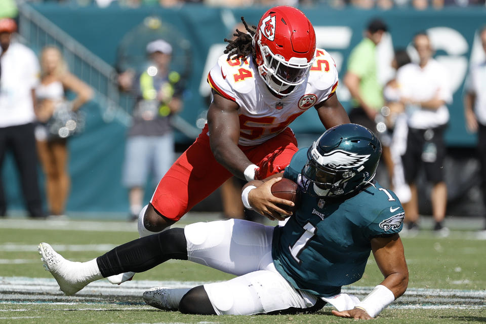 PHILADELPHIA, PENNSYLVANIA – OCTOBER 03: Jalen Hurts #1 of the Philadelphia Eagles slides as he’s tackled by Nick Bolton #54 of the Kansas City Chiefs at Lincoln Financial Field on October 03, 2021 in Philadelphia, Pennsylvania. (Photo by Tim Nwachukwu/Getty Images)