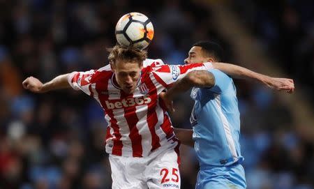 Soccer Football - FA Cup Third Round - Coventry City vs Stoke City - Ricoh Arena, Coventry, Britain - January 6, 2018 Stoke City's Peter Crouch in action with Coventry City’s Jordan Willis Action Images via Reuters/Carl Recine