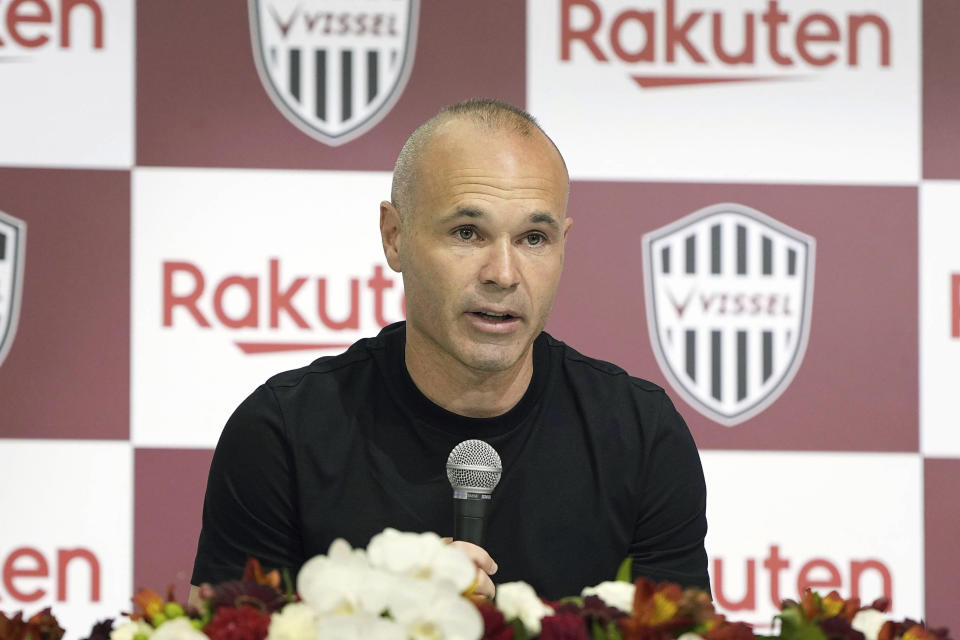 Andres Iniesta speaks at a press conference at a hotel in Kobe, western Japan Thursday, May 25, 2023. Iniesta, who won the World Cup with Spain in 2010, and four Champions League titles and nine La Liga championships with Barcelona, is leaving Japanese club Vissel Kobe, he said Thursday. (Kyodo News via AP)