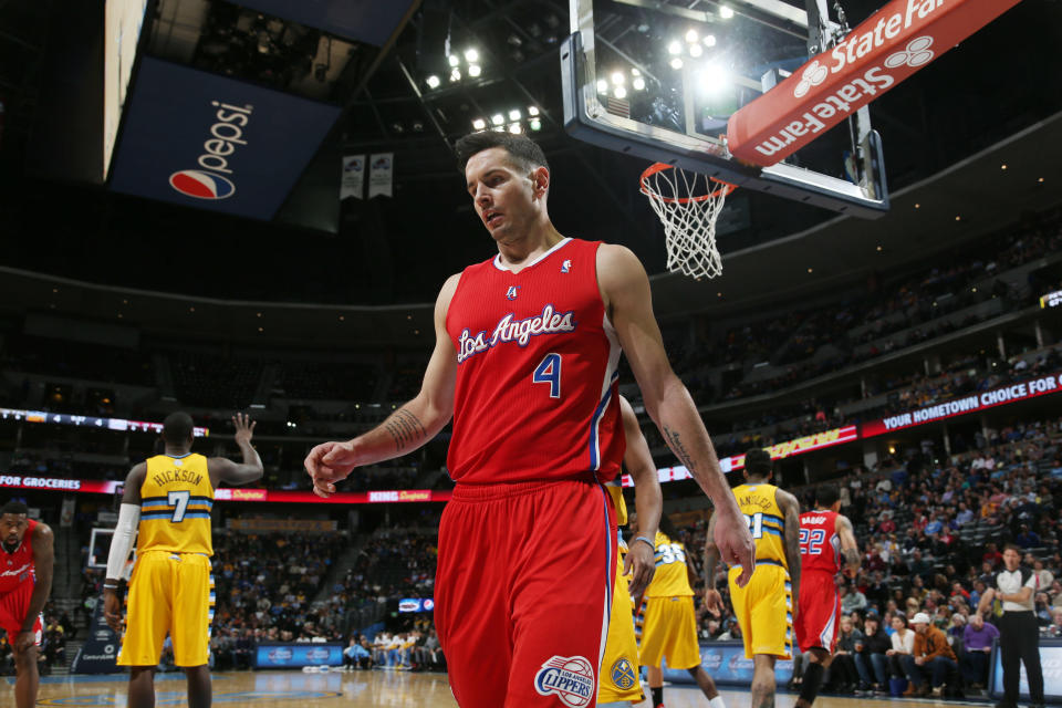 Los Angeles Clippers guard J.J. Redick waits to put the bal into play against the Denver Nuggets in the first quarter of an NBA basketball game in Denver on Monday, Feb. 3, 2014. (AP Photo/David Zalubowski)