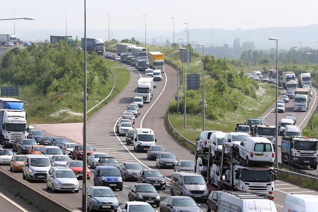 Traffic queues along the M25 in Dartford, Kent, as the bank holiday and half term rush begins.