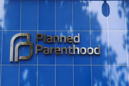 A sign is pictured at the entrance to a Planned Parenthood building in New York August 31, 2015. REUTERS/Lucas Jackson