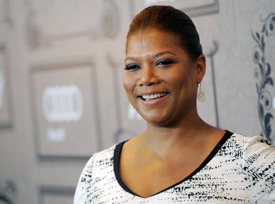 FILE - This Oct. 5, 2012 file photo shows Queen Latifah at Variety's 4th annual Power of Women event in Beverly Hills, Calif. Latifah's new talk show, "The Queen Latifah Show" comes out from Sony Pictures Television in September 2013. (Photo by Chris Pizzello/Invision/AP, file)