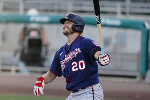 Minnesota Twins third baseman Josh Donaldson (20) is shown during a spring  training baseball game against the Boston Red Sox Thursday, March 11, 2021,  in Fort Myers, Fla.. (AP Photo/John Bazemore Stock