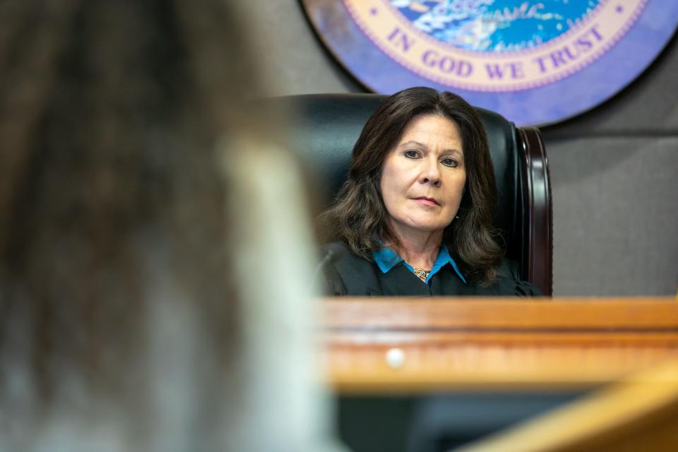 Circuit Judge Lisa Herndon listens as Neely Raye Pesognellie Petrie Blanchard questions neuropsychologist Dr. Jason Demery at Blanchard's murder trial at the Marion County Judicial Center in Ocala on Friday, April 19, 2024. Blanchard is representing herself.