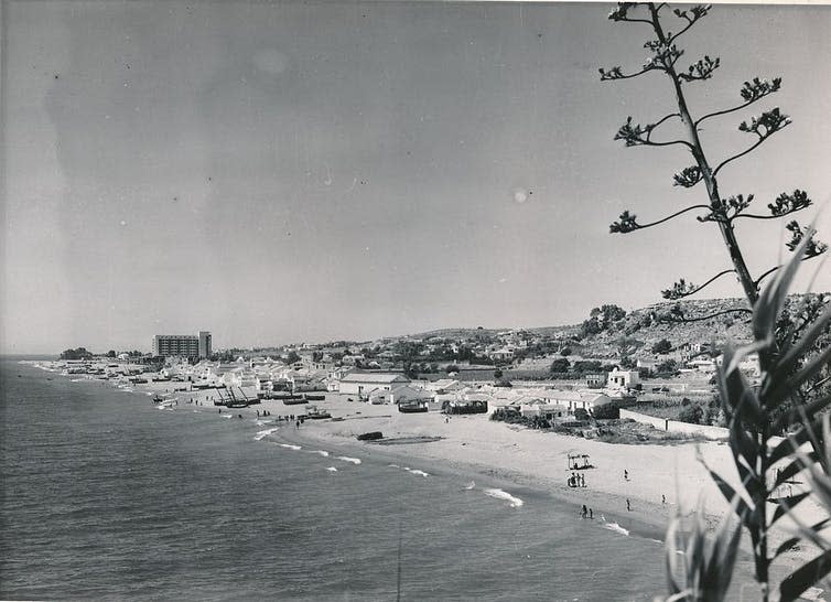 <span class="caption">Playa Torremolino, Malaga, in 1960.</span> <span class="attribution"><a class="link " href="https://upload.wikimedia.org/wikipedia/commons/a/a4/Playa_%28Torremolinos%292.jpg" rel="nofollow noopener" target="_blank" data-ylk="slk:Biblioteca de la Facultad de Empresa y Gestión Pública Universidad de Zaragoza | Wikimedia Commons;elm:context_link;itc:0;sec:content-canvas">Biblioteca de la Facultad de Empresa y Gestión Pública Universidad de Zaragoza | Wikimedia Commons</a>, <a class="link " href="http://creativecommons.org/licenses/by-sa/4.0/" rel="nofollow noopener" target="_blank" data-ylk="slk:CC BY-SA;elm:context_link;itc:0;sec:content-canvas">CC BY-SA</a></span>