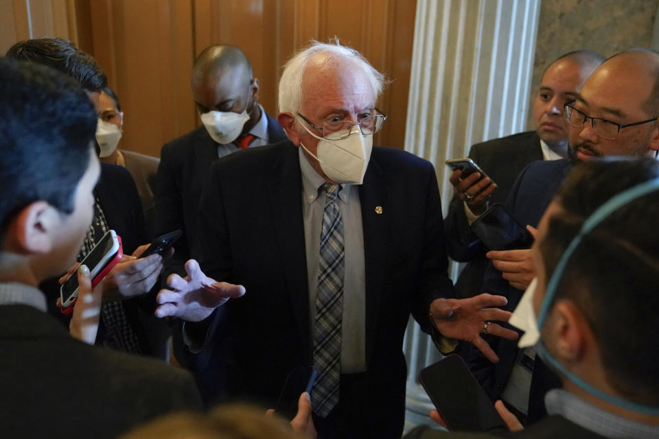 FILE - Sen. Bernie Sanders, I-Vt., speaks with reporters on Capitol Hill in Washington, Saturday, Aug. 6, 2022. Democrats pushed their election-year economic package to Senate passage Sunday, Aug. 7, 2022, a compromise less ambitious than Biden’s original domestic vision but one that still meets party goals of slowing global warming, moderating pharmaceutical costs and taxing immense corporations. (AP Photo/Patrick Semansky, File)