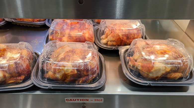 Rotisserie chickens in warming case 