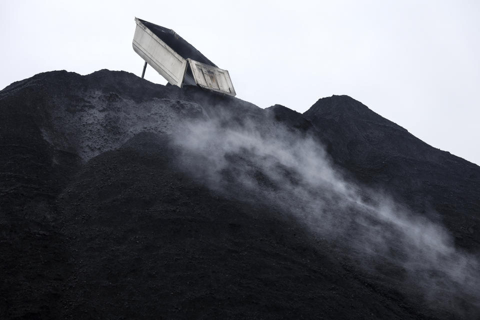 FILE - A heap of coal is pictured at the coal-fired power station, Nov. 29, 2022, in Saint-Avold, eastern France. United Nations Secretary-General Antonio Guterres urged world leaders to take “credible” new action to curb climate change, warning that efforts so far fall short of what’s needed to avert catastrophe. (AP Photo/Jean-Francois Badias, File)