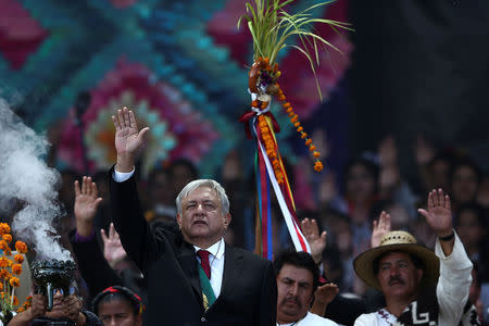 Mexico's President Andres Manuel Lopez Obrador takes part in an indigenous ceremony during the AMLO Fest at Zocalo square in Mexico City, Mexico December 1, 2018. REUTERS/Edgard Garrido