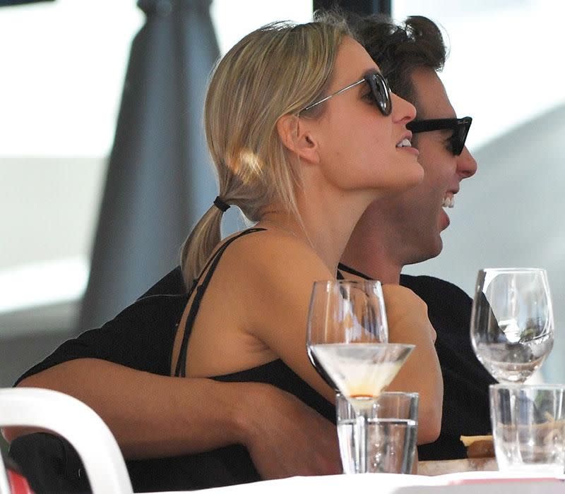 The swimmer was also seen in the company of a mystery blonde. Source: Splash