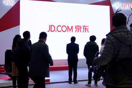 A JD.com sign is seen during the fourth World Internet Conference in Wuzhen, Zhejiang province, China, December 4, 2017. REUTERS/Aly Song