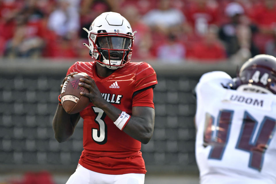 Louisville quarterback Malik Cunningham (3) looks for an open receiver during the first half of an NCAA college football game against Eastern Kentucky in Louisville, Ky., Saturday, Sept. 11, 2021. (AP Photo/Timothy D. Easley)