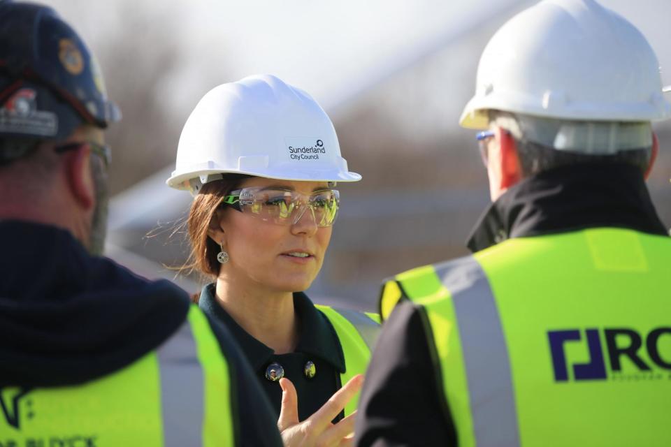 The Duchess of Cambridge talks to construction workers during a visit to the Northern Spire bridge: PA Wire/PA Images