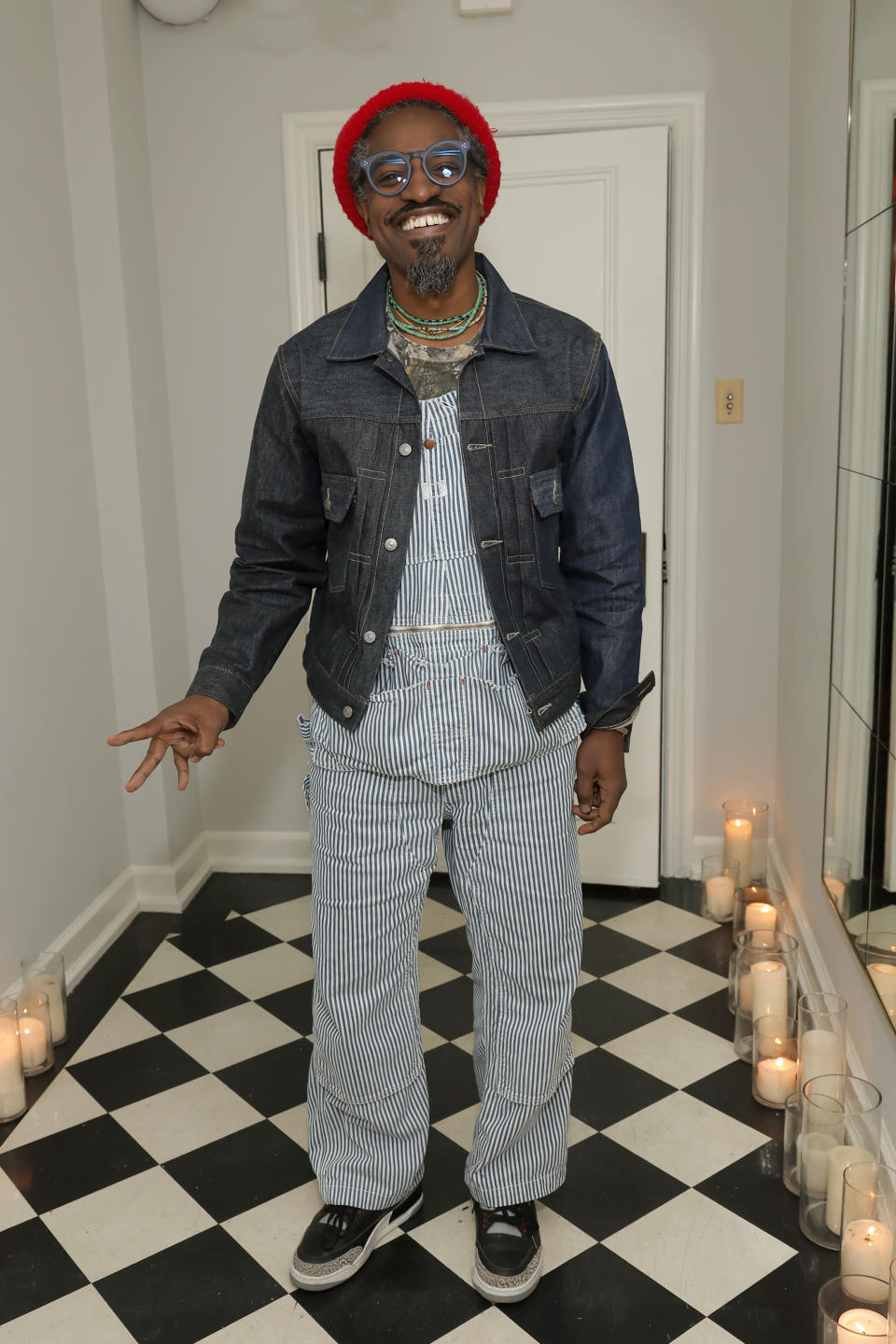 Andre 3000 wearing overalls 