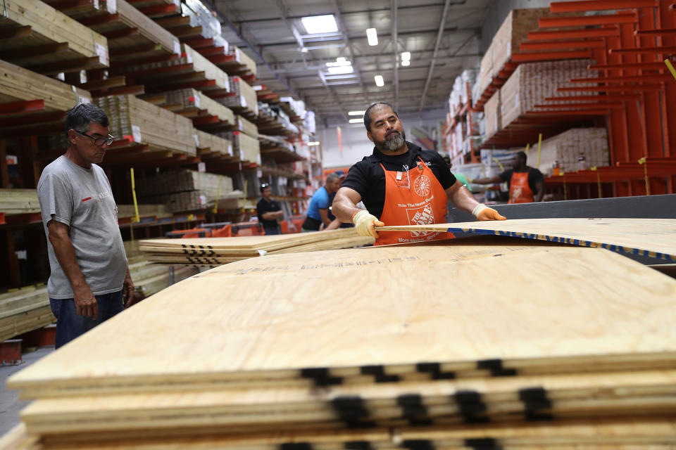 <p>People purchase plywood at The Home Depot as they prepare for Hurricane Irma on Sept. 6, 2017 in Miami, Fla. (Photo: Joe Raedle/Getty Images) </p>