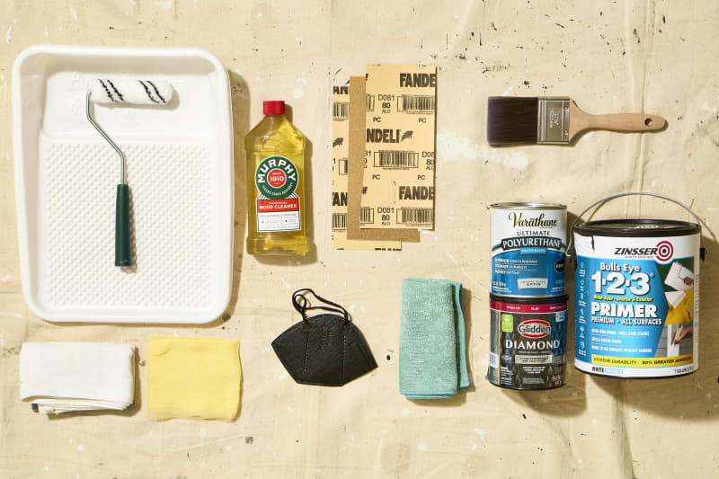 overhead shot of all of the materials needed to paint furniture.