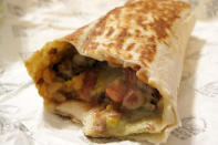 <div class="caption-credit"> Photo by: Credit: flickr/ rusteford</div><br> 5) Taco Bell <br> <b>XXL Grilled Stuft Beef Burrito (left) </b> <br> Fat: 42 grams <br> Calories: 880 <br> Sodium: 2,080 milligrams <br> <br> <b>Fiesta Taco Salad with Beef </b> <br> Fat: 42 grams <br> Calories: 780 <br> Sodium: 1,380 milligrams <br> <br> <b>Volcano Nachos</b> <br> Fat: 58 grams <br> Calories: 970 <br> Sodium: 1,670 milligrams <br>