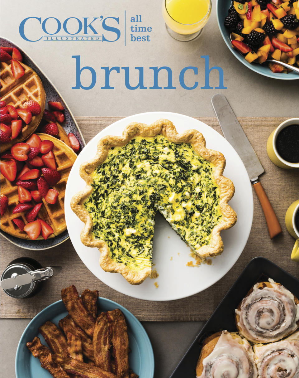 This image provided by America's Test Kitchen in October 2018 shows the cover for the cookbook “ATB Brunch.” It includes a recipe for a French onion and bacon tart. (America's Test Kitchen via AP)