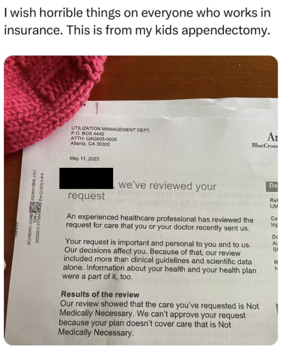 A hand clutching a denied insurance claim form stating "Medically Necessary" services are not covered