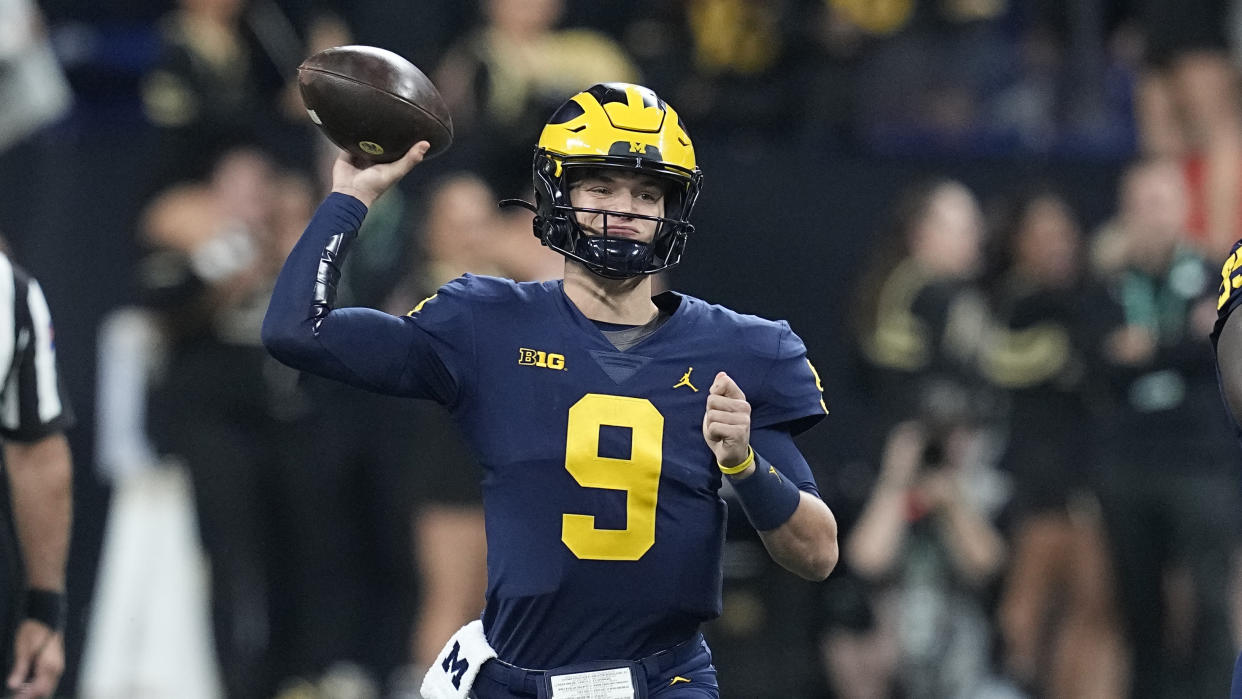 Michigan quarterback J.J. McCarthy throws during the first half of the Big Ten championship NCAA college football game against Purdue, Saturday, Dec. 3, 2022, in Indianapolis. (AP Photo/Darron Cummings)