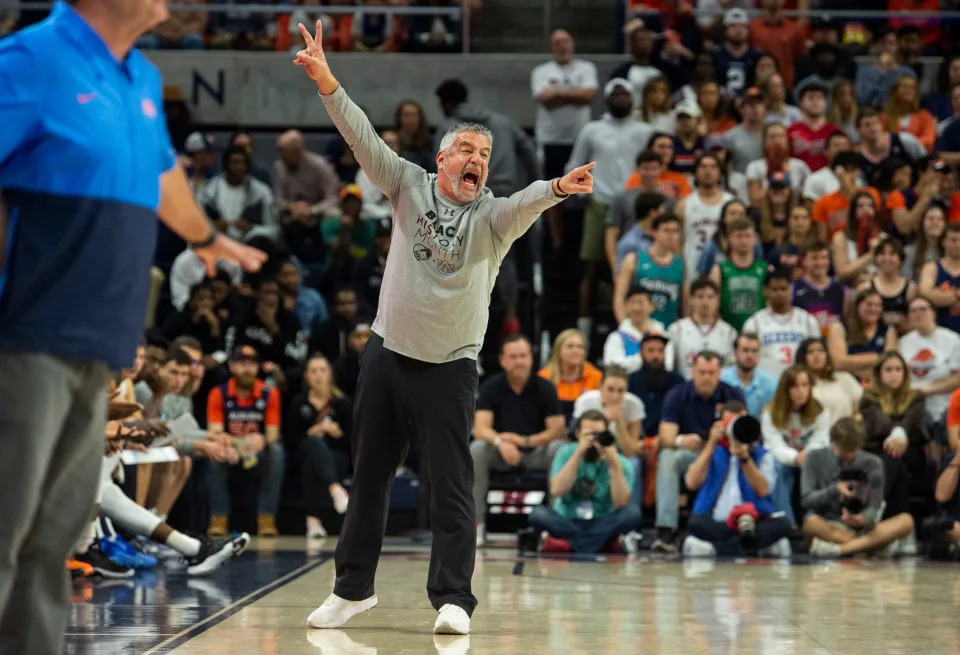 Auburn Tigers head coach Bruce Pearl talks with his team from the sideline as Auburn Tigers take on Mississippi Rebels at Auburn Arena in Auburn, Ala., on Wednesday, Feb. 23, 2022.