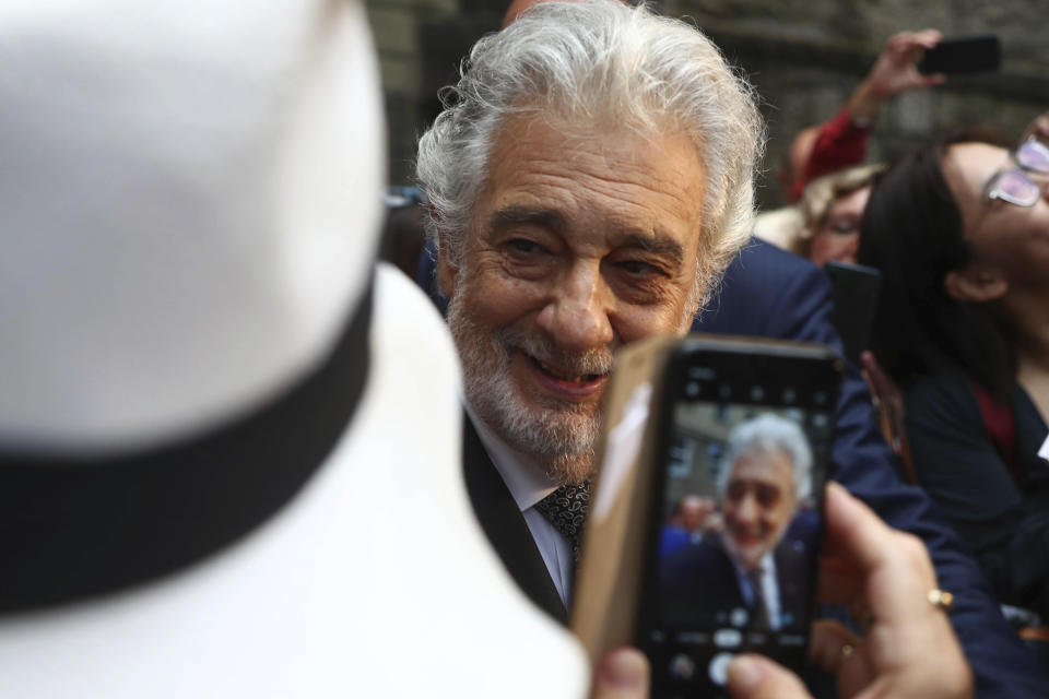 Placido Domingo talks to fans at the 'Festspielhaus' opera house after he performed 'Luisa Miller' by Giuseppe Verdi in Salzburg, Austria, Sunday, Aug. 25, 2019. Domingo is scheduled to appear onstage at the Salzburg Festival to perform for the first time since multiple women have accused the opera legend of sexual harassment in allegations brought to light by The Associated Press. (AP Photo/Matthias Schrader)