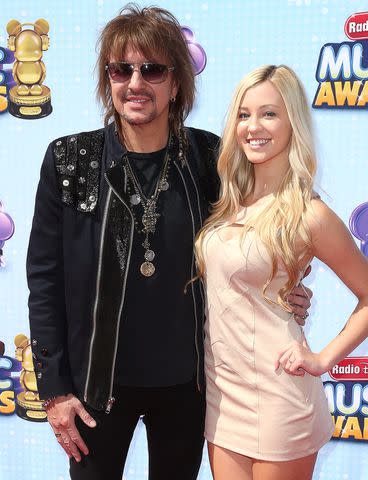 <p>Frederick M. Brown/Getty</p> Richie Sambora (L) and actress Ava Sambora attend the 2014 Radio Disney Music Awards at the Nokia Theatre L.A. Live on April 26, 2014 in Los Angeles, California.