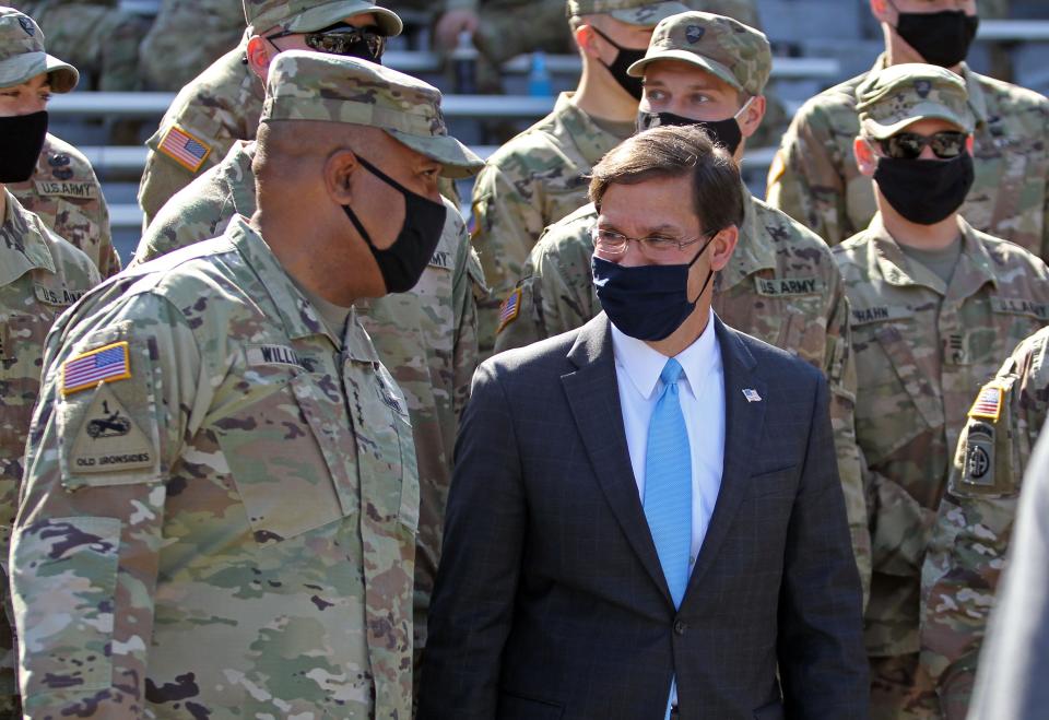 United States Secretary of Defense Mark Esper, a West Point graduate, greets cadets before a game between Army and The Citadel at Michie Stadium.