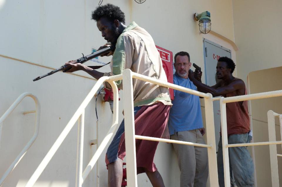 This film image released by Sony - Columbia Pictures shows, from left, Mahat Ali, Tom Hanks and Faysal Ahmed in a scene from "Captain Phillips." (AP Photo/Sony - Columbia Pictures)