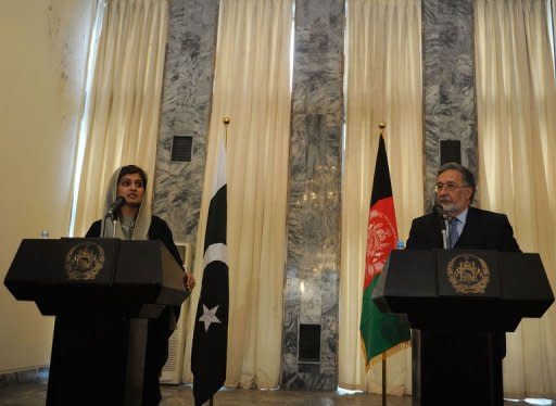 Pakistan's Foreign Minister Hina Rabbani Khar (L) and her Afghan counterpart Zalmai Rasool give a joint press conference at the Foreign Ministry in Kabul. Pakistan Wednesday rejected accusations that it was secretly supporting Taliban insurgents in Afghanistan, while the Taliban denied plans for peace talks with the Afghan government in Saudi Arabia