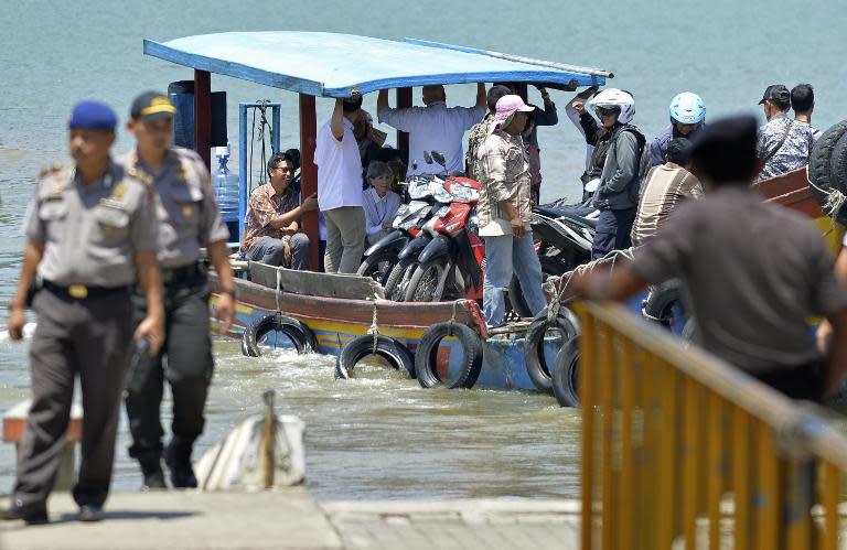 Australia's Consul General to Bali Majell Hind and lawyer Julian McMahon travel to Nusakambang island prison, central Java island on March 6, 2015, where Australian death row inmates Andrew Chan and Myuran Sukumaran are awaiting the firing squad