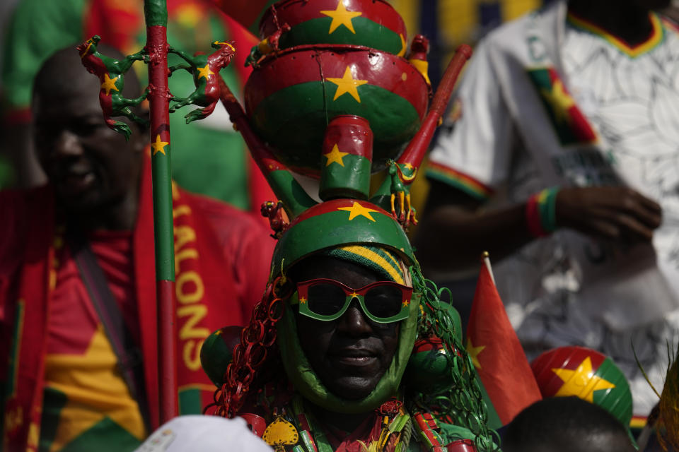 A Burkina Faso supporter waits for the second half during the African Cup of Nations Group D soccer match between Algeria and Burkina Faso at the Peace of Bouake stadium in Bouake, Ivory Coast, Saturday, Jan. 20, 2024. (AP Photo/Themba Hadebe)