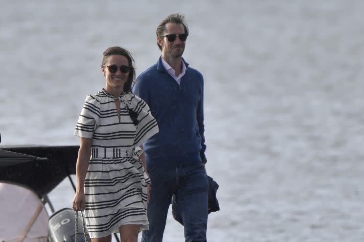 Pippa Middleton and James Matthews were seen braving the rain and wind as they arrived in Rose Bay, Sydney. <i>(Splash)</i>