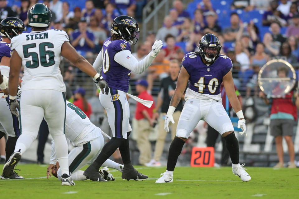 Aug 12, 2023; Baltimore, Maryland, USA; Baltimore Ravens linebacker Malik Harrison (40) celebrates after sacking <a class="link " href="https://sports.yahoo.com/nfl/teams/philadelphia/" data-i13n="sec:content-canvas;subsec:anchor_text;elm:context_link" data-ylk="slk:Philadelphia Eagles;sec:content-canvas;subsec:anchor_text;elm:context_link;itc:0">Philadelphia Eagles</a> quarterback <a class="link " href="https://sports.yahoo.com/nfl/players/28390" data-i13n="sec:content-canvas;subsec:anchor_text;elm:context_link" data-ylk="slk:Marcus Mariota;sec:content-canvas;subsec:anchor_text;elm:context_link;itc:0">Marcus Mariota</a> (8) during the first half at M&T Bank Stadium. Mandatory Credit: Tommy Gilligan-USA TODAY Sports