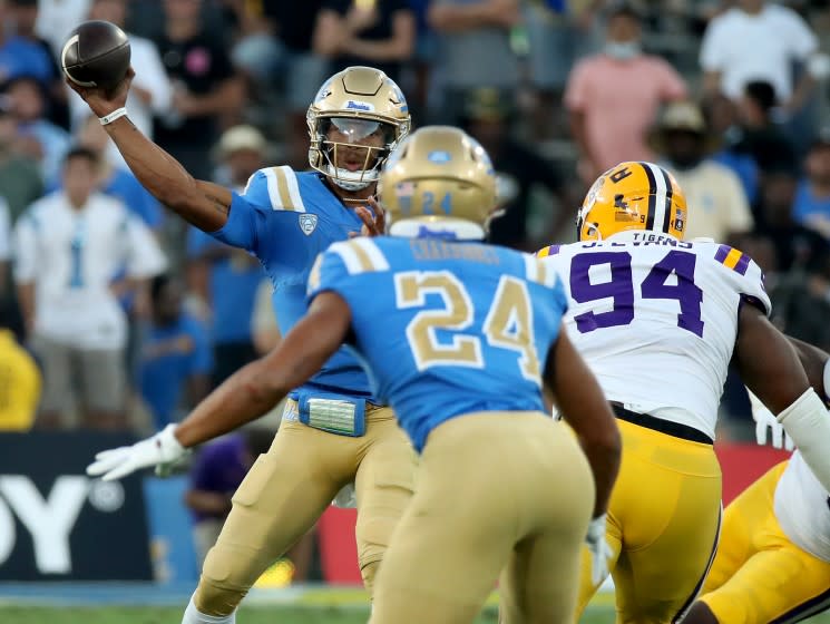 PASADENA, CALIF. - SEP. 4, 2021. UCLA quarterback Dorian Thompson-Robinson passes.