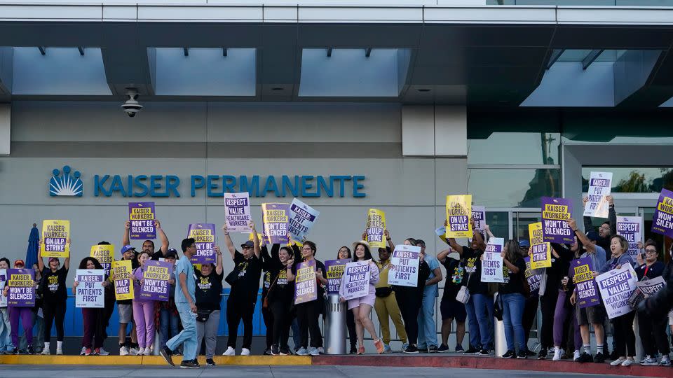 Kaiser Permanente healthcare workers rally outside Kaiser Permanente Los Angeles Medical Center in Los Angeles on Wednesday, October 4, 2023.  - Damian Dovarganes/AP