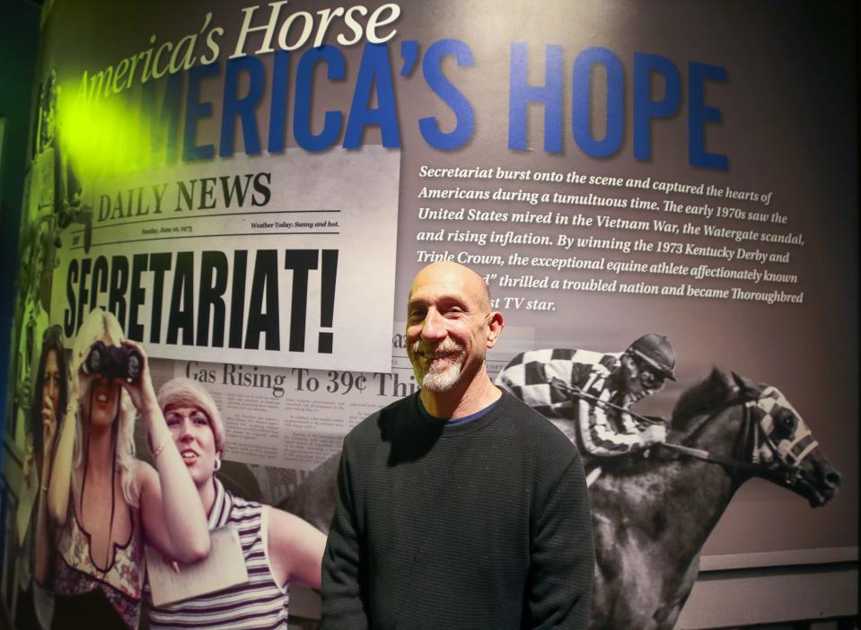 Leonard Lusky poses in the Secretariat exhibit at the Kentucky Derby Museum on Thursday, April 6, 2023